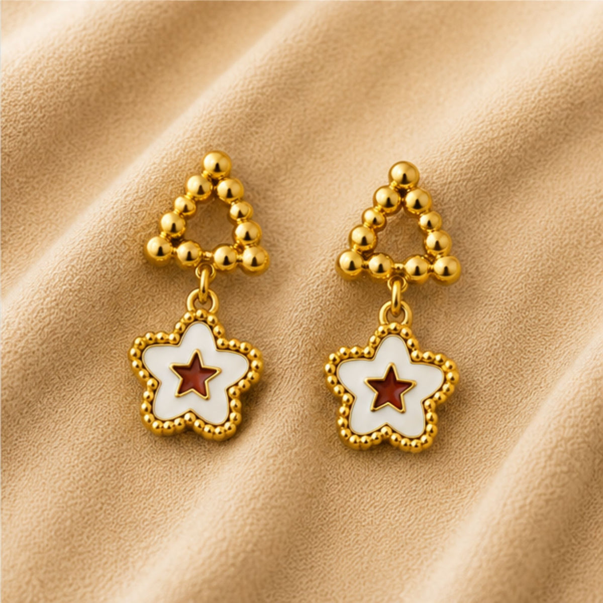 Gold Star Drop Earrings with White Floral Detail