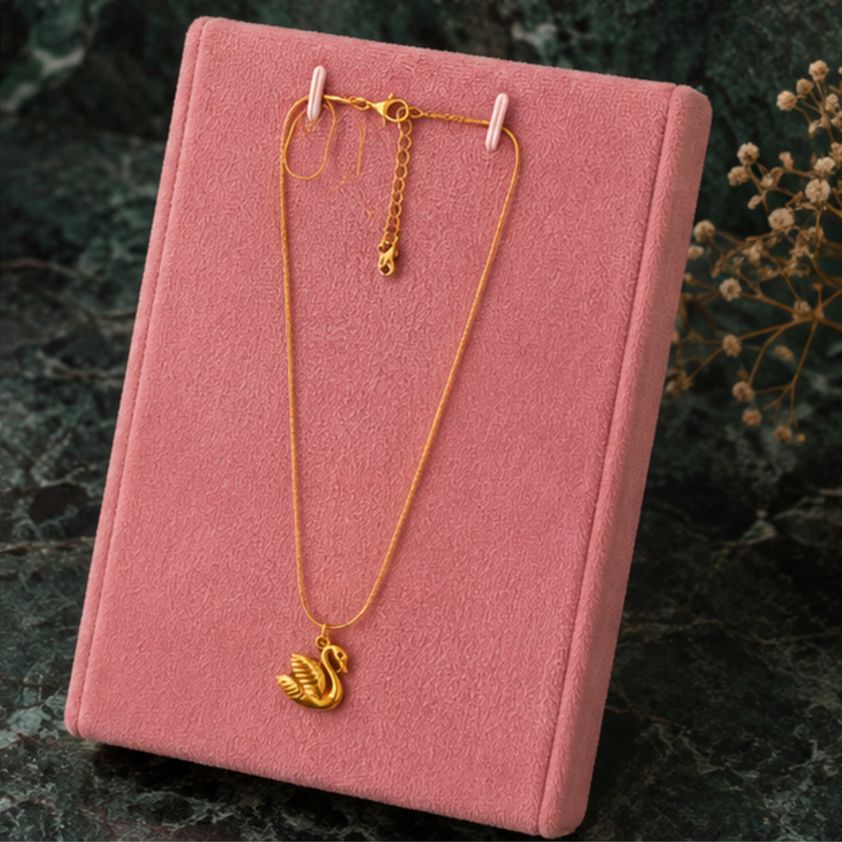 Minimal gold tone swirl pendant necklace with a fine chain designed for everyday wear by Maelle