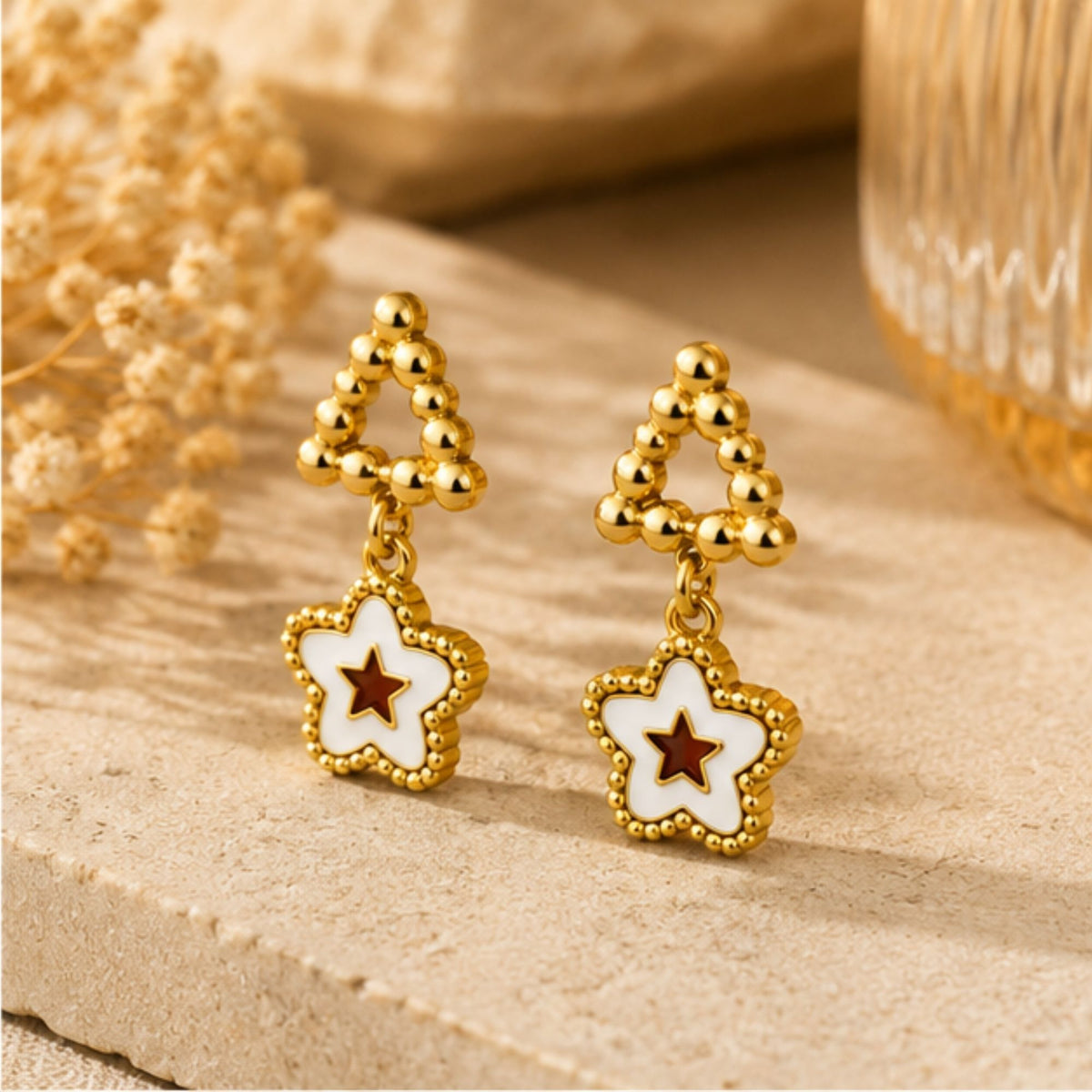 Gold Star Drop Earrings with White Floral Detail