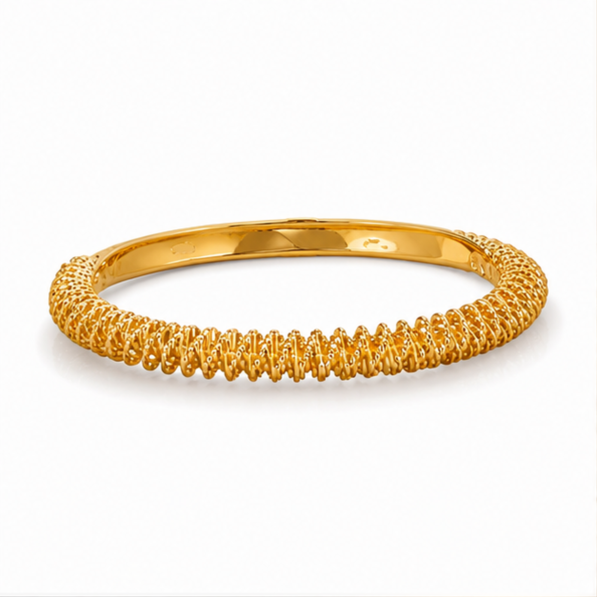 Maelle gold tone textured bangle bracelet featuring an elegant polished design for everyday wear