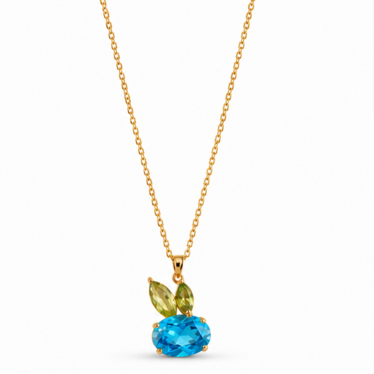 Maelle gold tone pendant necklace featuring a blue crystal centerpiece and delicate chain