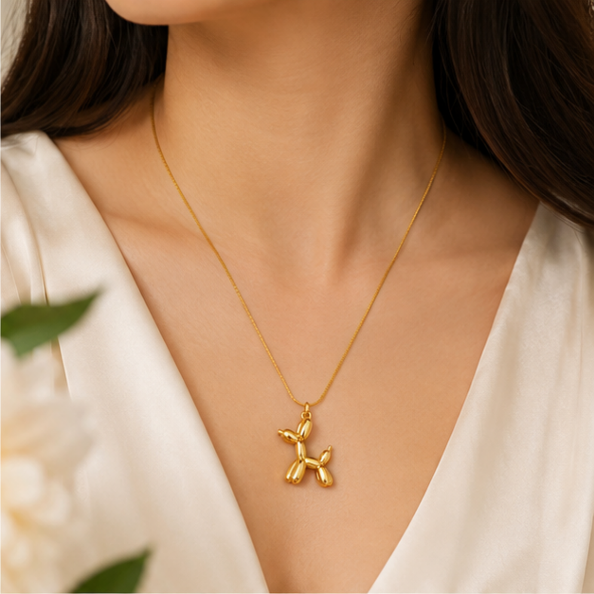 Gold tone floral pendant necklace for women with a delicate chain by Maelle