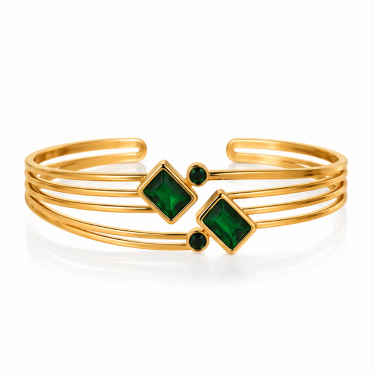 Maelle gold tone open cuff bracelet featuring an elegant green square accent