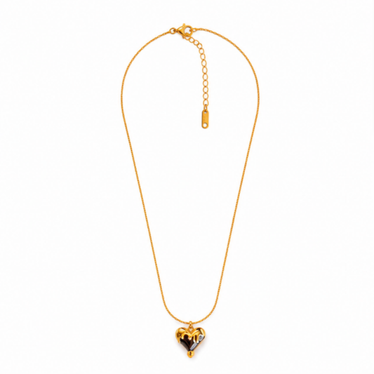 Maelle gold tone heart pendant necklace with a delicate chain for everyday elegance